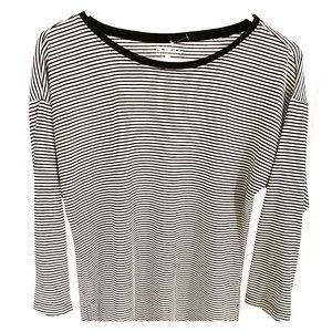 Tunic length black and white stripped top.